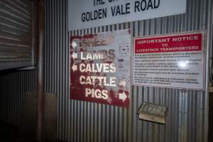 Signage at unloading area - Signs with notices to truck drivers regarding reporting animals transported and delivered - Captured at Benalla Abattoir, Benalla VIC Australia.