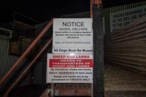 Signage at unloading area - Signs with notices to truck drivers regarding reporting animals transported and delivered - Captured at Benalla Abattoir, Benalla VIC Australia.