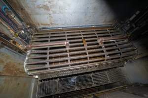 Top view of gondolas and walkway - A top view of gondolas and walkway in a Butina backloader gas chamber - Captured at Diamond Valley Pork, Laverton North VIC Australia.