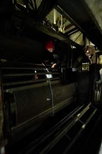Activists prepare to chain themselves inside the gas chamber - Activists shut down Benalla Slaughterhouse - Captured at Benalla Abattoir, Benalla VIC Australia.