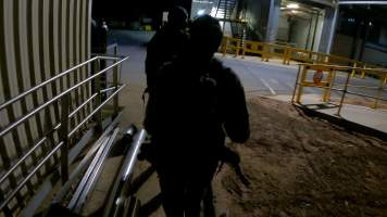 Investigators approaching Corowa Slaughterhouse - Captured at Corowa Slaughterhouse, Redlands NSW Australia.