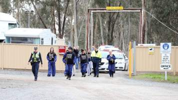 Hatchery lockdown action - In July 2016, 100 activists from across the country converged on the facility in Huntly, Victoria, with 21 entering the hatchery by surprise and halting operations for two hours in an effort to draw further public attention to the inherent cruelty of the egg industry. Over 150 male chicks - some just seconds from being killed - were rescued and are now living out their lives, happily and healthily, with experienced carers. 

Photos captured by the Bendigo Advertiser. - Captured at SBA Hatchery, Bagshot VIC Australia.