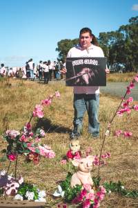 Animal activists asking for the release of Olivia (sow 8416) at Midland Bacon in Victoria - Image taken outside Midland Bacon, where a worker was filmed r*ping sow 8416 (now named Olivia) while she was trapped inside her farrowing crate. This day of action was part of the campaign to Free Olivia. - Captured at Midland Bacon, Carag Carag VIC Australia.