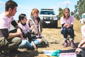 Animal activists asking for the release of Olivia (sow 8416) at Midland Bacon in Victoria - Image taken outside Midland Bacon, where a worker was filmed r*ping sow 8416 (now named Olivia) while she was trapped inside her farrowing crate. This day of action was part of the campaign to Free Olivia. - Captured at Midland Bacon, Carag Carag VIC Australia.