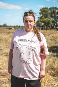 Animal activists asking for the release of Olivia (sow 8416) at Midland Bacon in Victoria - Image taken outside Midland Bacon, where a worker was filmed r*ping sow 8416 (now named Olivia) while she was trapped inside her farrowing crate. This day of action was part of the campaign to Free Olivia. - Captured at Midland Bacon, Carag Carag VIC Australia.