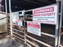 Gate and signs outside Benalla Slaughterhouse holding pens - Captured at Benalla Abattoir, Benalla VIC Australia.