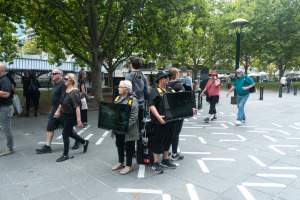 Animal rights activists at Dominion Outreach Melbourne - Animal rights activists attending a street outreach event in Southbank, Melbourne, Australia to bring awareness to the reality of modern animal farming and slaughter practices using footage from Dominion. - Captured at VIC.