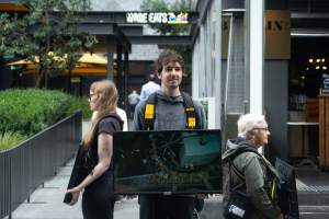 Animal rights activists at Dominion Outreach Melbourne - Animal rights activists attending a street outreach event in Southbank, Melbourne, Australia to bring awareness to the reality of modern animal farming and slaughter practices using footage from Dominion. - Captured at VIC.