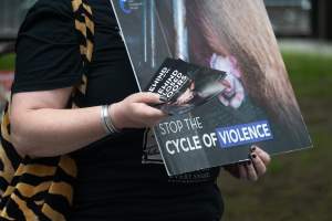 Animal rights activists at Dominion Outreach Melbourne - Animal rights activists attending a street outreach event in Southbank, Melbourne, Australia to bring awareness to the reality of modern animal farming and slaughter practices using footage from Dominion. - Captured at VIC.