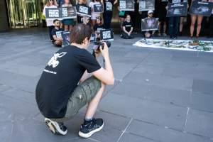 Animal rights activists attending the Rally For Pigs 2025 - Animal rights activists attending a rally outside Victorian Premier, Jacinta Allan's office. Around 50 protestors laid the bodies of dead piglets outside the office, each one symobolising one of the twenty piggeries which had been investigated in a coordinated effort by numerous teams of anonymous activists over the weekend of January 18 & 19, 2025. - Captured at VIC.