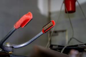 Electric stunning tongs - Captured at Carey Bros Abattoir, Yangan QLD Australia.