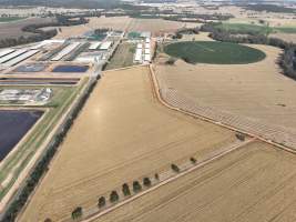 Drone flyover of Moxey Dairy - Moxey Farms is the first and largest property operated by Australian Fresh Milk Holdings (AFMH). It is also the largest single-site dairy in the country, housing and milking thousands of cows across nine freestall barns and three milking parlours, plus a maternity shed, feed centre and hospital. AFMH is the country’s biggest dairy farming operator.
At any given time, Moxey Dairy houses 11,000 cows and is milking 5,500 of those cows each day, producing 40 litres of milk per cow per day. Annually, the farm produces 80 million litres of milk, or 220,000 litres per day.
- Captured at Moxey Dairy, Paytens Bridge NSW Australia.