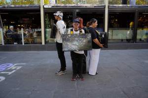 Mother's Day: Dominion Outreach Melbourne: 11 May 2025 - Animal rights activists participating in a street outreach event in Southbank, Victoria, Australia. Volunteers give out free vegan treats, show footage from Farm Transparency Project’s dairy investigations, and engage the public in conversations, bringing awareness to the hidden reality of what happens to cows, calves, and bulls in the Australian dairy industry. - Captured at VIC.