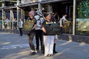 Mother's Day: Dominion Outreach Melbourne: 11 May 2025 - Animal rights activists participating in a street outreach event in Southbank, Victoria, Australia. Volunteers give out free vegan treats, show footage from Farm Transparency Project’s dairy investigations, and engage the public in conversations, bringing awareness to the hidden reality of what happens to cows, calves, and bulls in the Australian dairy industry. - Captured at VIC.