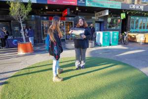 5 Question Challenge: Dominion Outreach Melbourne: 15 June 2025 - Animal rights activists participating in a street outreach event in St Kilda, Victoria, Australia. Some volunteers hold placards inviting pedestrians to answer 5 questions in exchange for a vegan treat. Others hold TVs showing footage from Farm Transparency Project’s dairy investigations. Together, they bring awareness to the hidden reality of what happens to cows, calves, and bulls in the Australian dairy industry. - Captured at VIC.
