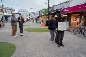 5 Question Challenge: Dominion Outreach Melbourne: 15 June 2025 - Animal rights activists participating in a street outreach event in St Kilda, Victoria, Australia. Some volunteers hold placards inviting pedestrians to answer 5 questions in exchange for a vegan treat. Others hold TVs showing footage from Farm Transparency Project’s dairy investigations. Together, they bring awareness to the hidden reality of what happens to cows, calves, and bulls in the Australian dairy industry. - Captured at VIC.