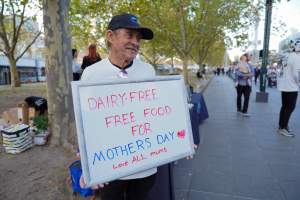 Mother's Day: Dominion Outreach Melbourne: 11 May 2025 - Animal rights activists participating in a street outreach event in Southbank, Victoria, Australia. Volunteers give out free vegan treats, show footage from Farm Transparency Project’s dairy investigations, and engage the public in conversations, bringing awareness to the hidden reality of what happens to cows, calves, and bulls in the Australian dairy industry. - Captured at VIC.