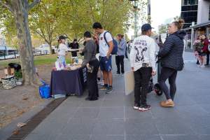 Mother's Day: Dominion Outreach Melbourne: 11 May 2025 - Animal rights activists participating in a street outreach event in Southbank, Victoria, Australia. Volunteers give out free vegan treats, show footage from Farm Transparency Project’s dairy investigations, and engage the public in conversations, bringing awareness to the hidden reality of what happens to cows, calves, and bulls in the Australian dairy industry. - Captured at VIC.