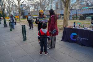 22 June 2025: 5 Question Challenge: Dominion Outreach Melbourne - Animal rights activists participating in a street outreach event in Southbank, Victoria, Australia. Some volunteers hold placards inviting pedestrians to answer 5 questions in exchange for a vegan treat. Others hold TVs showing footage from Farm Transparency Project’s dairy investigations. Together, they bring awareness to the hidden reality of what happens to cows, calves, and bulls in the Australian dairy industry. - Captured at VIC.