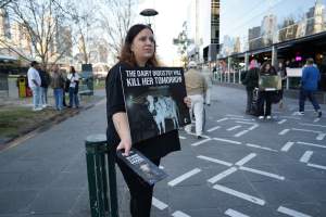 3 August 2025: Dominion Outreach Melbourne: Shut Down Slaughterhouses - Animal rights activists participating in a street outreach event in Southbank, Naarm/Melbourne. Some wear TVs showing footage from Farm Transparency Project's slaughterhouse investigations as part of the Shut Down Slaughterhouses campaign. Others hold placards or engage the public in conversations. Together, they bring awareness to the hidden reality of what happens to animals inside slaughterhouses. - Captured at VIC.