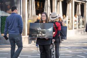 3 August 2025: Dominion Outreach Melbourne: Shut Down Slaughterhouses - Animal rights activists participating in a street outreach event in Southbank, Naarm/Melbourne. Some wear TVs showing footage from Farm Transparency Project's slaughterhouse investigations as part of the Shut Down Slaughterhouses campaign. Others hold placards or engage the public in conversations. Together, they bring awareness to the hidden reality of what happens to animals inside slaughterhouses. - Captured at VIC.