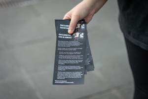 3 August 2025: Dominion Outreach Melbourne: Shut Down Slaughterhouses - Animal rights activists participating in a street outreach event in Southbank, Naarm/Melbourne. Some wear TVs showing footage from Farm Transparency Project's slaughterhouse investigations as part of the Shut Down Slaughterhouses campaign. Others hold placards or engage the public in conversations. Together, they bring awareness to the hidden reality of what happens to animals inside slaughterhouses. - Captured at VIC.