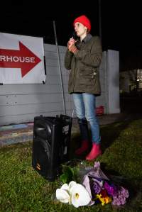 Cedar Meats Vigil - National Week Of Action 2025 - During the Shut Down Slaughterhouses Week of Action, we held a vigil outside of the Cedar Meats slaughterhouse in Brooklyn, Victoria.

During a two week investigation last year, our hidden cameras captured the handling and slaughter of animals, including newborn lambs and kids born in the holding pens of the slaughterhouse.

It was a Wednesday night when we gathered outside the slaughterhouse, holding signs and listening to music and speeches from investigators. We wanted to send a message to Cedar Meats, to let them know that we have not forgotten how they treat animals when they believe that no one is watching

We poured fake blood across their driveway as a visual reminder to everyone passing by, that animals arriving here are coming to their deaths. At the gates to the slaughterhouse, we each left a flower.

The images of animals whose deaths we have seen will haunt us forever, but we are determined to continue to fight in their name. - Captured at Cedar Meats, Brooklyn VIC Australia.