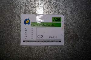 Sign at Farm Pride pullet farm - Photographs taken at the Farm Pride pullet farm, next door to their free-range egg farm. 

Although described as 'free-range' young hens, known as pullets, were discovered confined to battery cages, strikingly similar to those found on cage egg farms. Hens are introduced into the laying sheds at between 18-20 weeks and will remain there until their laying slows at 12-18 months old. This means that, for up to a quarter of their life, these 'free-range' chickens will live in small, wire cages with no access to the outdoors. 18 months old 'spent' hens are sent to the slaughterhouse where they will be killed and turned into cheap meat products.
 - Captured at Farm Pride Bears Lagoon - Pullet raising, Bears Lagoon VIC Australia.