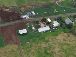 Drone flyover - Drone flyover of unknown dairy farm showing dairy and calf sheds. - Captured at Unknown, Jervois SA Australia.