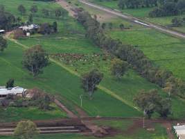 Drone flyover - Drone flyover of unknown dairy showing calf sheds and milking shed. - Captured at Unknown Dairy - Devondale, Woods Point SA Australia.
