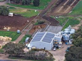 Drone flyover - Drone flyover of unknown dairy showing calf sheds and milking shed. - Captured at Unknown Dairy - Devondale, Woods Point SA Australia.