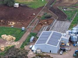 Drone flyover - Drone flyover of unknown dairy showing calf sheds and milking shed. - Captured at Unknown Dairy - Devondale, Woods Point SA Australia.