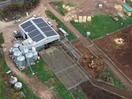Drone flyover - Drone flyover of unknown dairy showing calf sheds and milking shed. - Captured at Unknown Dairy - Devondale, Woods Point SA Australia.