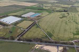 Drone flyover of broiler (meat) chicken farm - Captured at Pavilion Farm 6, Anakie VIC Australia.