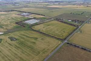 Drone flyover of broiler (meat) chicken farm - Captured at Pavilion Farm 1, Anakie VIC Australia.