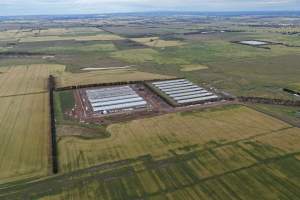 Drone flyover of broiler (meat) chicken farm - Captured at Pavilion Farm 2, Anakie VIC Australia,Pavilion Farm 12 (under construction), Anakie VIC Australia.