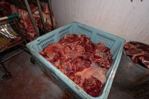 Crates of meat in chiller - Handheld photos taken at Goulburn Valley Stock Removers, owned by horse dealer Peter Loffel. Ex-racehorses are illegally killed on his residential property then transported to the knackery, where they are processed into pet food. The knackery also processes dead cows, mainly dairy cows. - Captured at Goulburn Valley Stock Removers, Shepparton North VIC Australia.